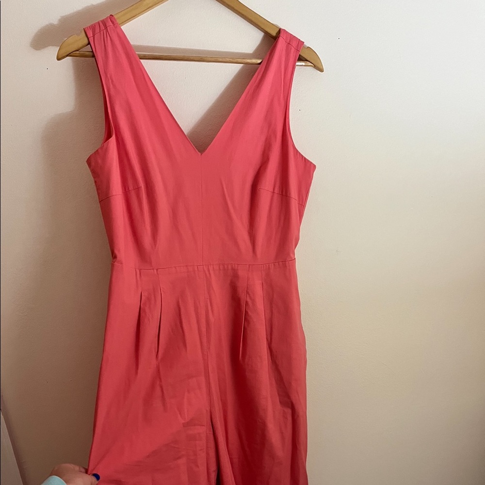j crew. Salmon colored with pockets. Tie around back to make bow!